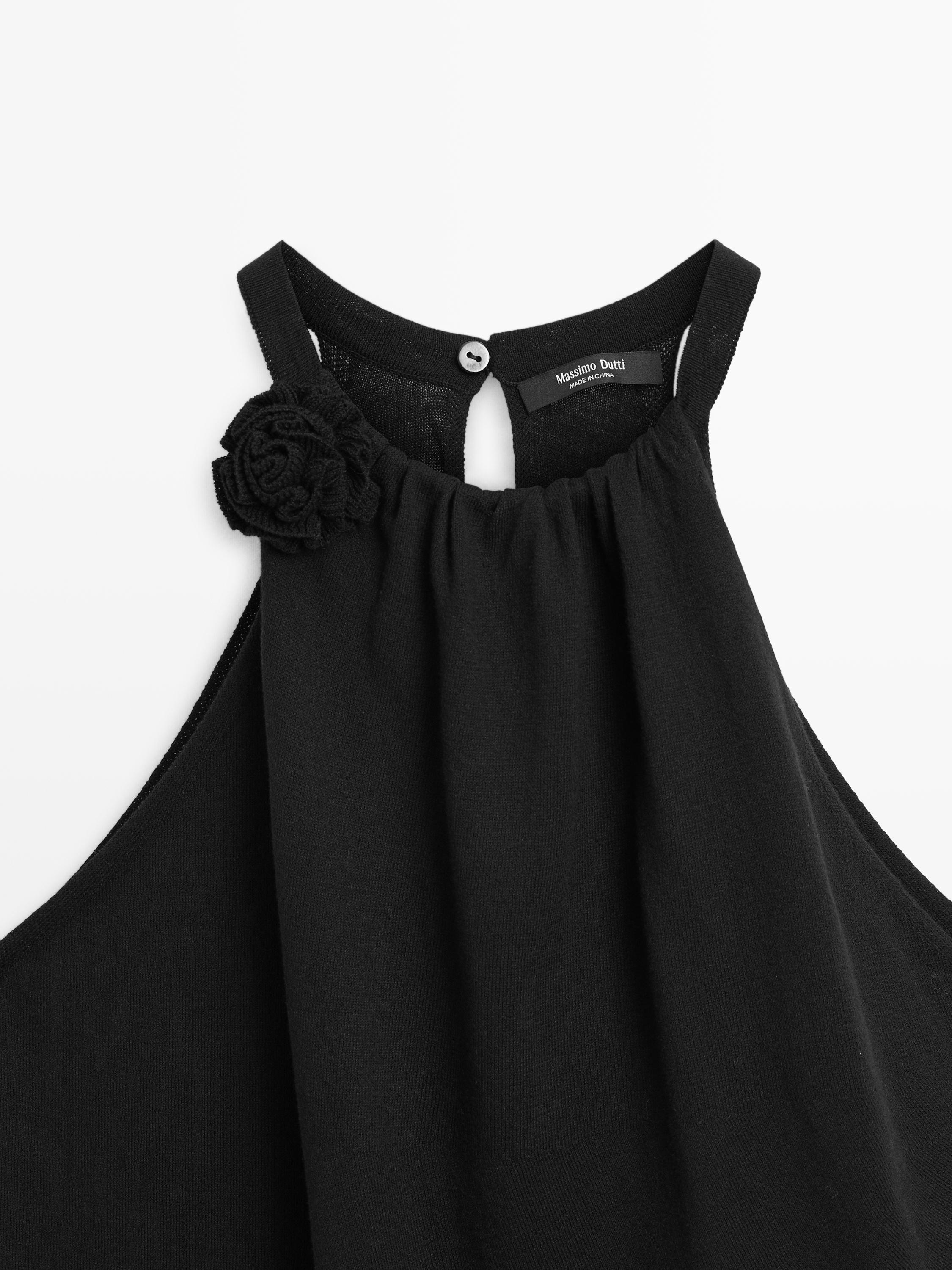 Knit cotton top with floral detail